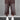 Brown wide-leg cropped pants with faded thighs, raw hems and pearl-beaded sides and drawstrings, worn with white sneakers.