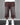 Brown wide-leg cropped pants with faded thighs, raw hems and pearl-beaded sides and drawstrings, worn with white sneakers.