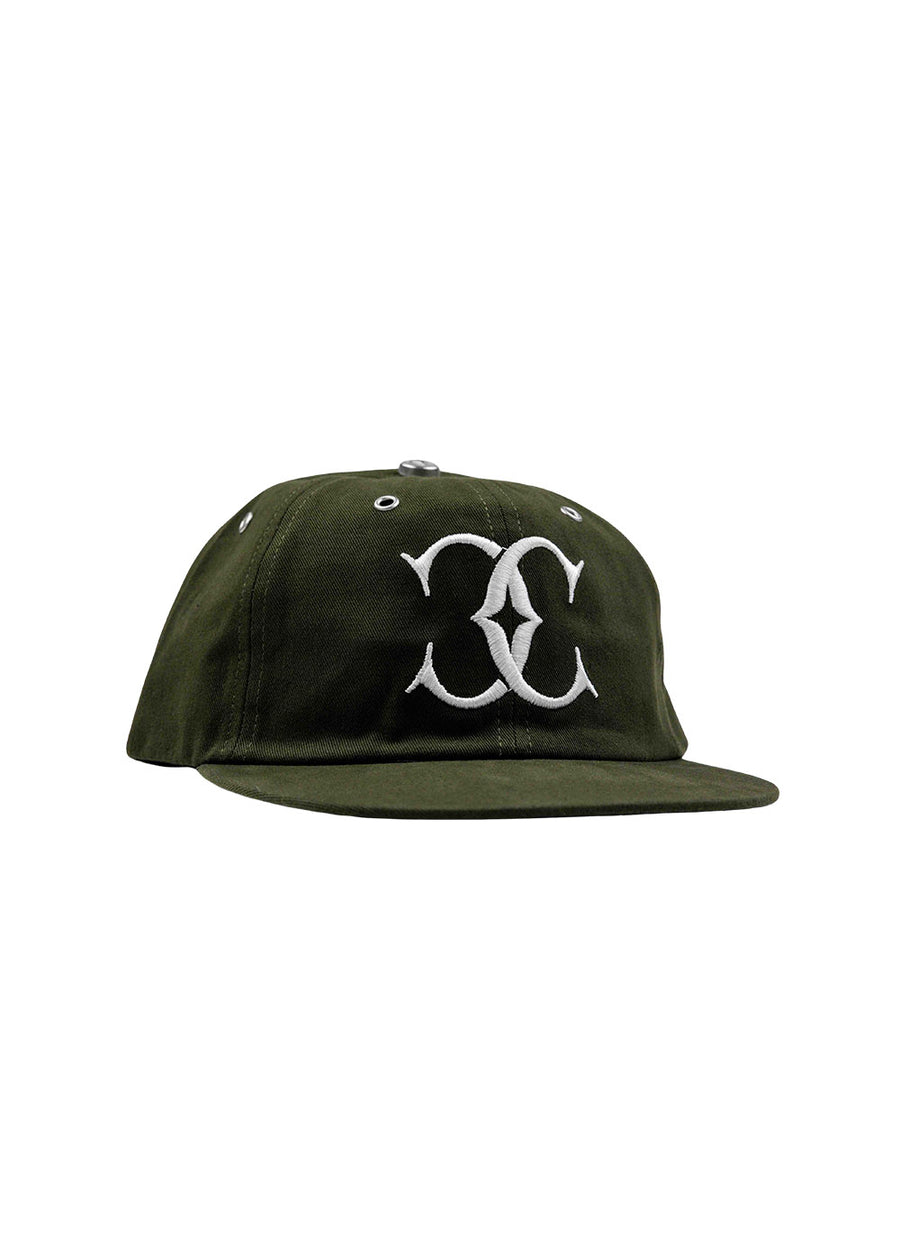 Olive green fabric baseball cap with a flat brim, white embroidered logo, and metal eyelets on a white background.