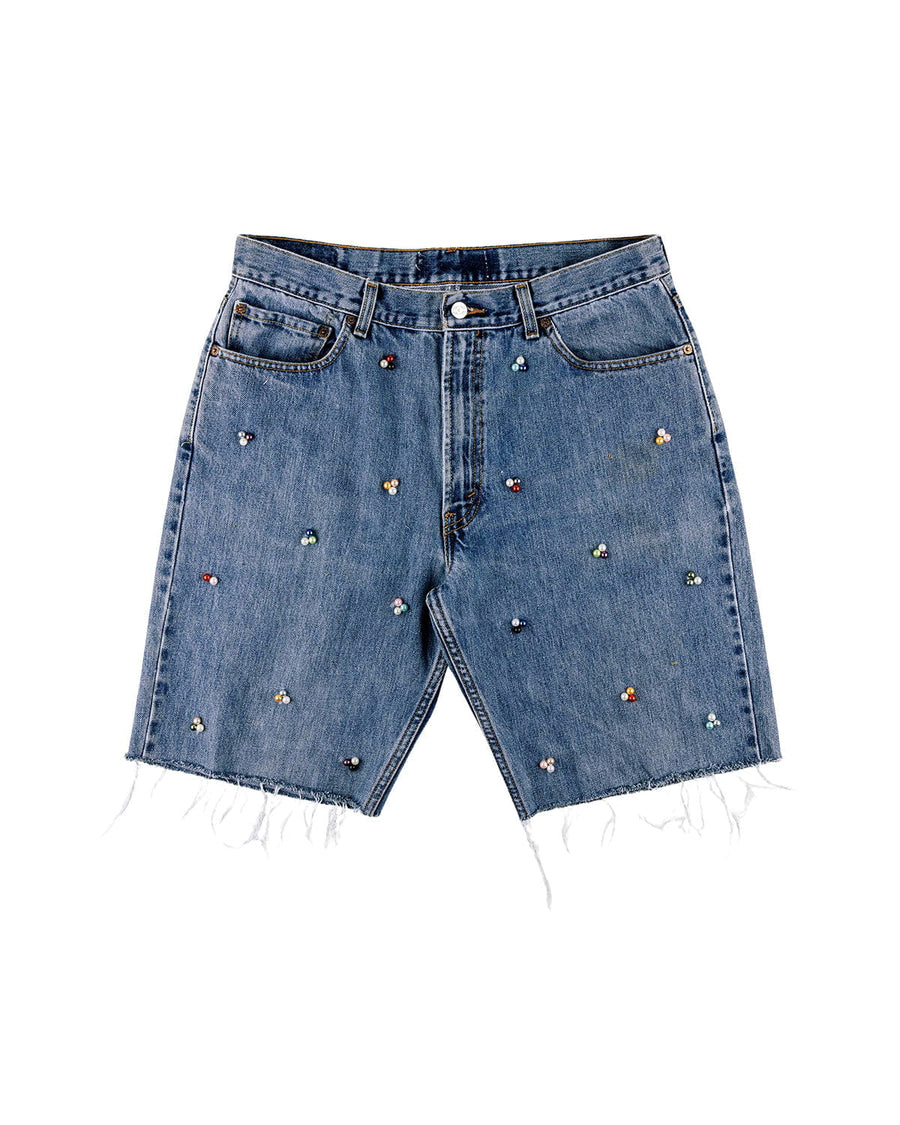 Blue denim shorts with multicolored bead clusters, front pockets, belt loops, and frayed hems on a white background.