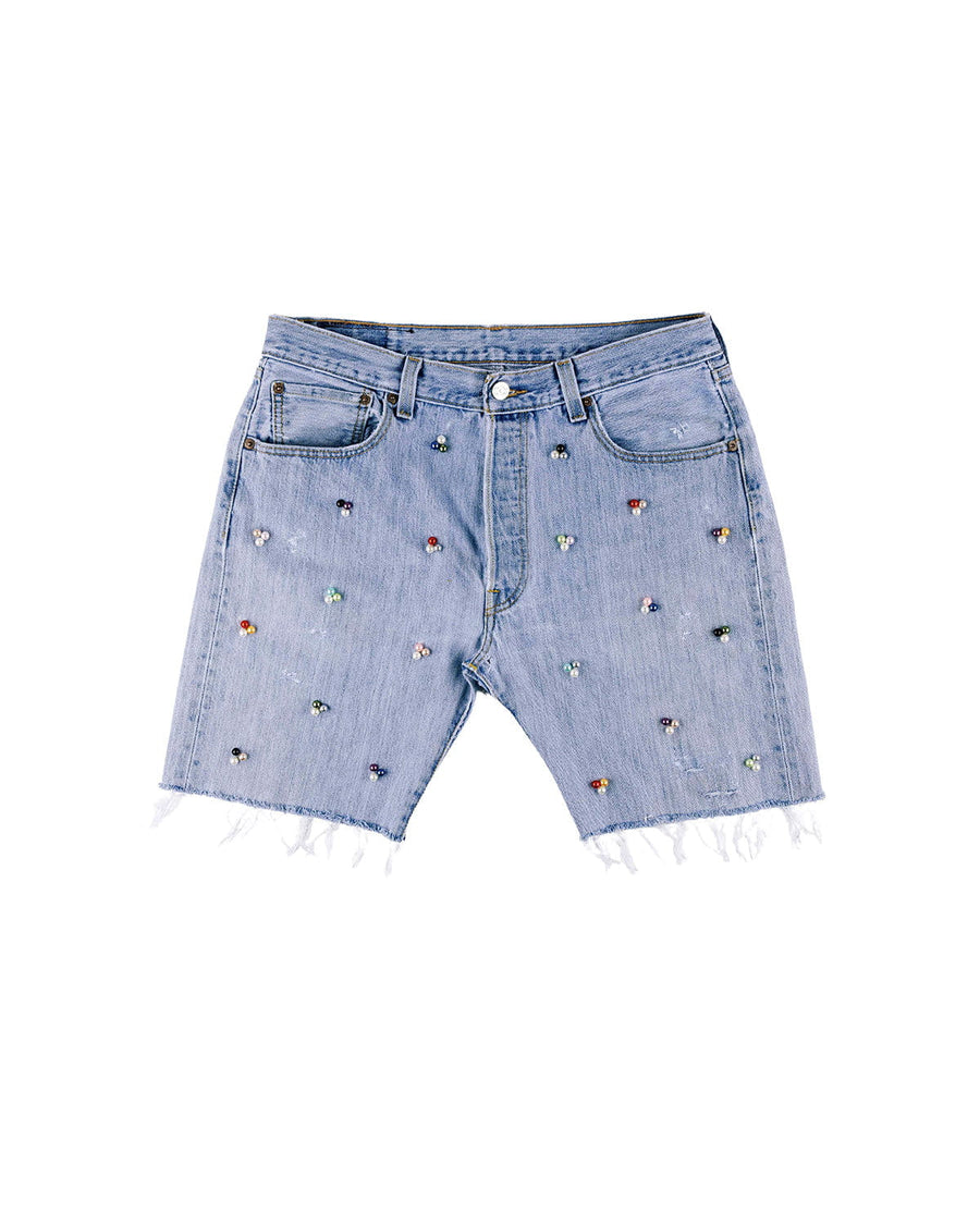 Light blue denim shorts with multicolored bead clusters, front pockets, belt loops, and frayed hems on a white background.