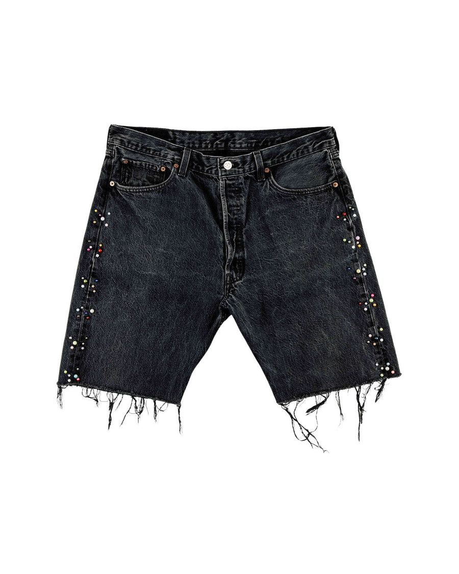 Washed black denim shorts with frayed hems, front pockets, belt loops, and multicolored beads along the sides.